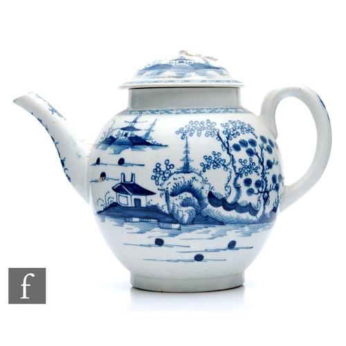 75 - A large late 18th Century Worcester teapot of globular form decorated in the blue and white Cannonba... 