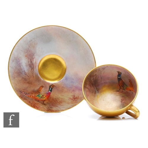 87 - An early 20th Century Royal Worcester cabinet cup and saucer decorated by Jas Stinton, with hand pai... 