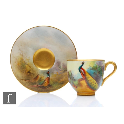 92 - An early 20th Century matched Royal Worcester cabinet coffee cup and saucer decorated by Stinton and... 