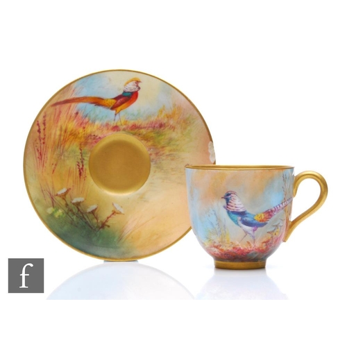 93 - An early 20th Century Royal Worcester cabinet coffee cup and saucer decorated by Austin and Sedgley,... 