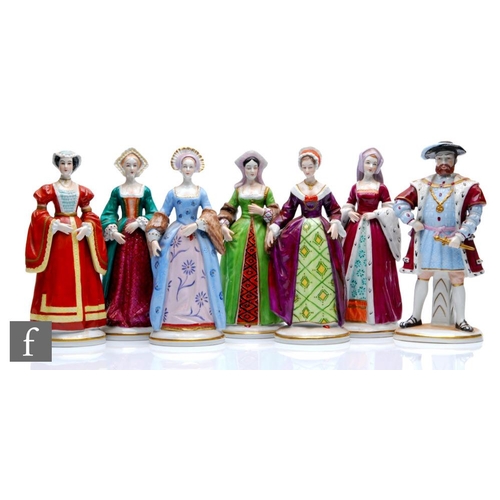 98 - A set of Sitzendorf models of Henry VIII and his six wives, each titled to the backs, each with prin... 