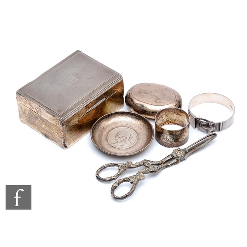 264 - A small parcel lot of assorted hallmarked silver and plated items to include, a cigarette box, napki... 