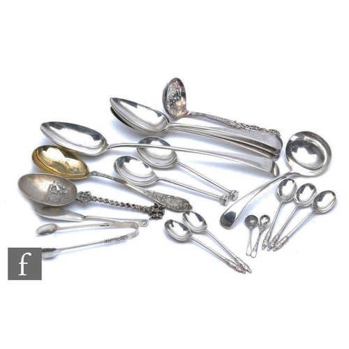 266 - A parcel lot of assorted hallmarked silver flatware to include table and shifting spoons, total weig... 