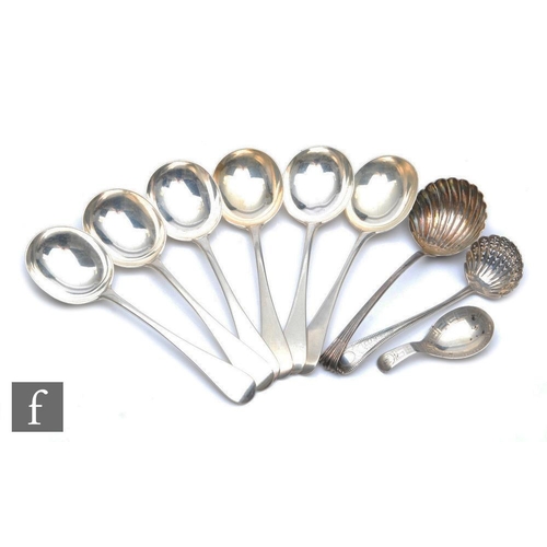 298 - A set of six plain dessert spoons, London 1922, two sifter spoons and a caddy spoon Birmingham 1805,... 