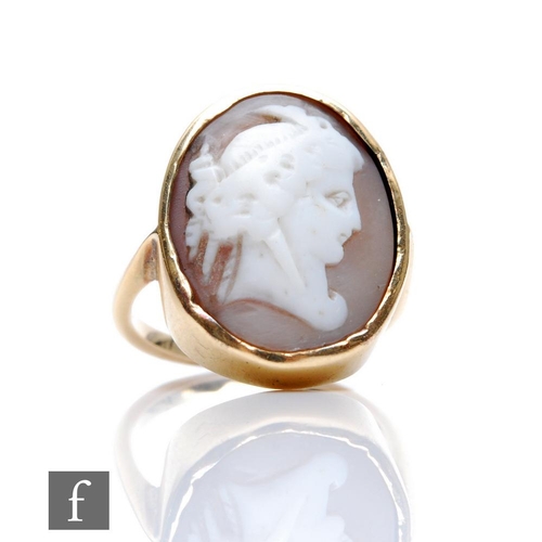 309 - A 9ct cameo ring, profile of a classical woman, weight 5.7g, length 3cm, ring size P, damaged.