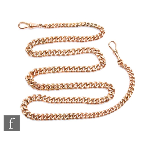 348 - A 9ct rose gold graduated single Albert chain, weight 74.5g, length 68cm, terminating in end swivels... 