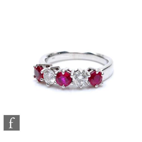 355 - An 18ct white gold ruby and diamond five stone ring, three rubies spaced by diamonds each approximat... 