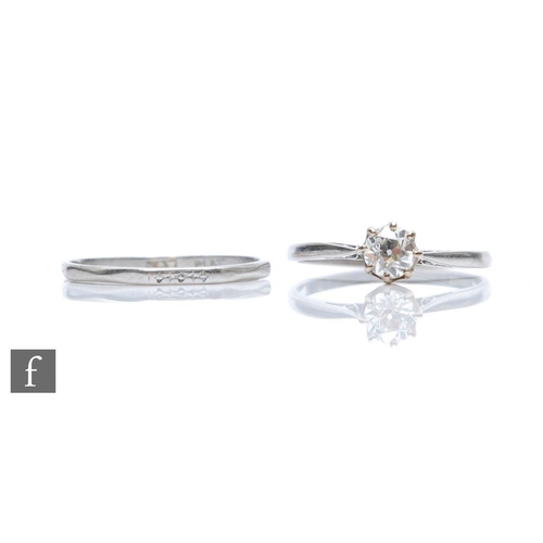 383 - A platinum diamond solitaire ring, old cut claw set stone, weight approximately 0.65ct, to knife edg... 