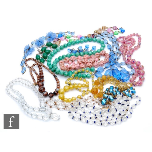 403 - Fifteen assorted 1920s and later beaded necklaces of varying form and colour to include glass and ha... 