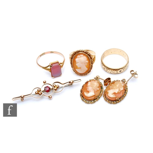 413 - A 9ct gold cameo set dress ring, a pair of matching earrings, a 9ct gold agate set signet ring, a go... 