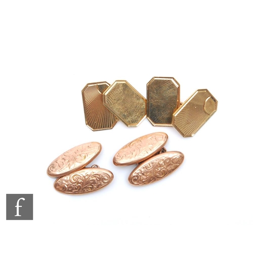 427 - A pair of 9ct gold lozenge cufflinks engraved with a sunburst design and a pair of engraved oval cuf... 