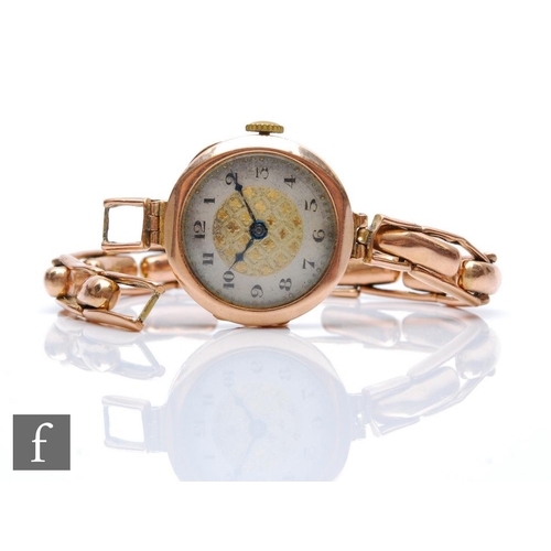 437 - A 9ct hallmarked rose gold, manual wind wrist watch, Arabic numerals to a circular dial, case diamet... 