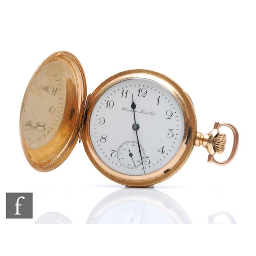 450 - An early 20th Century American gold plated crown wind full hunter pocket watch, Arabic numerals to a... 