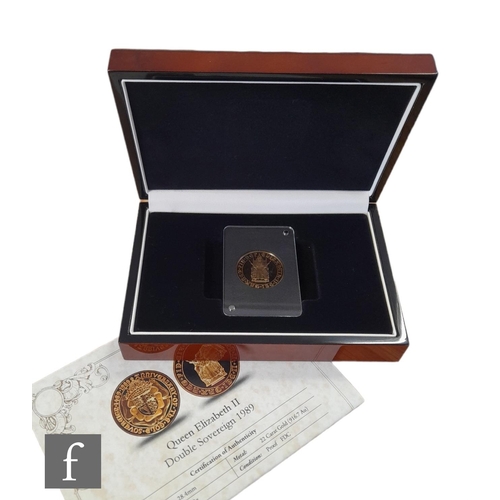 216 - An Elizabeth II double sovereign dated 1989, certificate and cased.