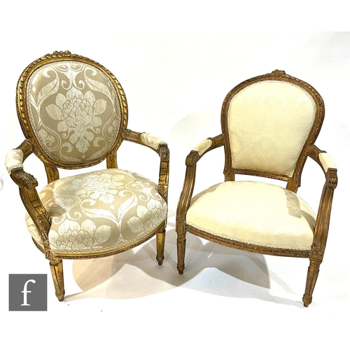 1056 - Two late 19th to early 20th Century fauteuil chairs in the French style, with gilt and gesso detail ... 