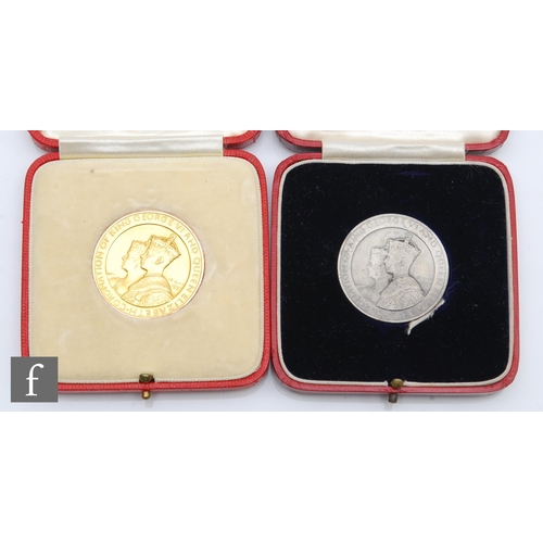 256 - A 9ct gold commemorative medallion for the Coronation of King George VI and Queen Elizabeth for the ... 