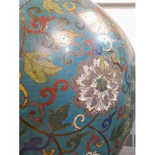 170 - A Chinese 18th or 19th Century cloisonne tianqiuping vase, the rounded body extending to a slender n... 