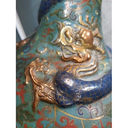 170 - A Chinese 18th or 19th Century cloisonne tianqiuping vase, the rounded body extending to a slender n... 