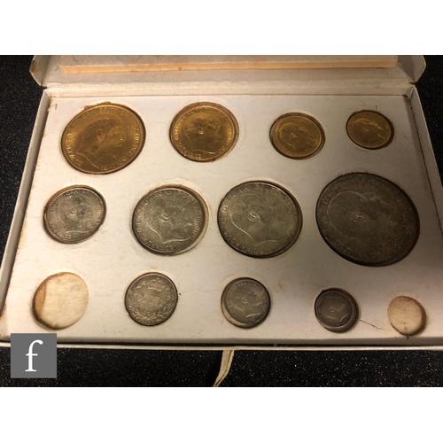 249 - An Edward VII 1902 specimen coin set to include five pounds, two pounds, sovereign, half sovereign, ... 