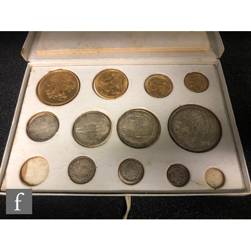 249 - An Edward VII 1902 specimen coin set to include five pounds, two pounds, sovereign, half sovereign, ... 