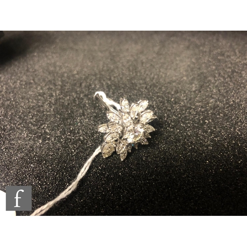 359 - A mid 20th Century 18ct white gold diamond cluster ring, central brilliant cut stone weight approxim... 