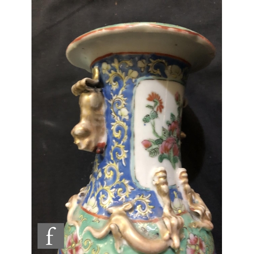 174 - A pair of late 19th Century Chinese Famille rose vases, each of ovoid form rising to a slender neck ... 