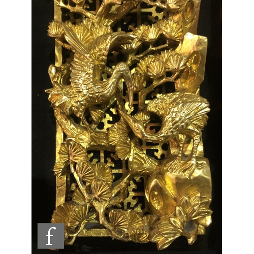 177 - A group of four Chinese reticulated carved wooden panels, each of the trellis work panels, carved in... 