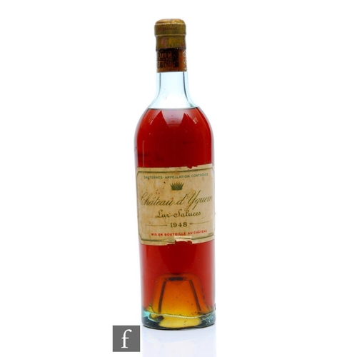 935 - A 1948 bottle of Chateau d' Yquem.