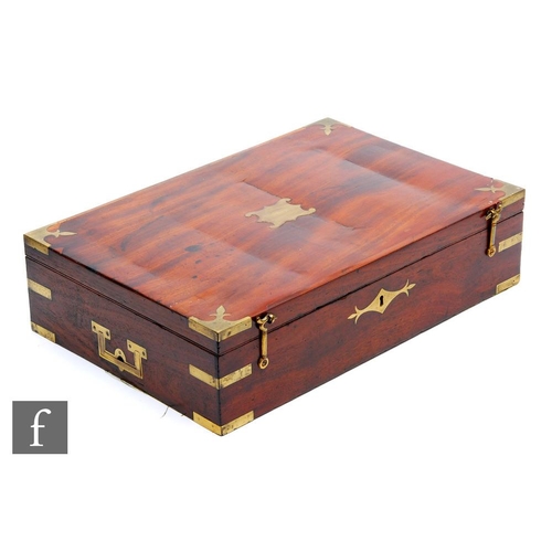 979 - A 19th Century mahogany brass corner mounted box, possibly a pistol case, lacking interior fittings,... 