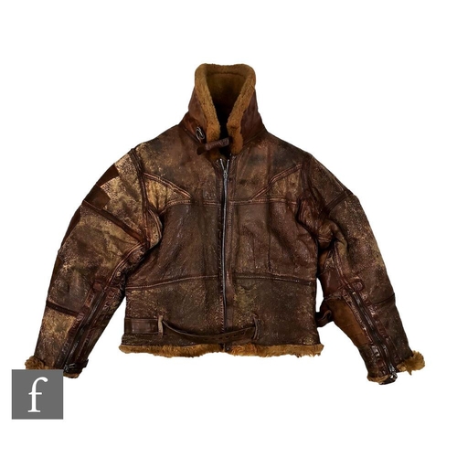 992 - A World War Two or later leather fur lined flying jacket, size medium to large, repairs.