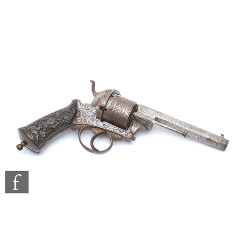 994 - A late 19th to early 20th Century pin fire six shot pistol, engraved with floral decoration, the sto... 