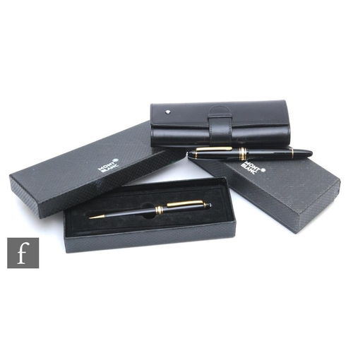 662 - A Mont Blanc black cased fountain pen, the nib marked 1810, in leather case, and a matching Meisters... 