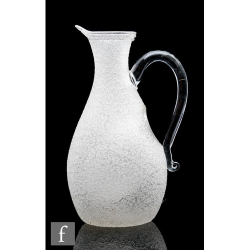 180 - A late Victorian clear crystal glass jug, of ovoid form with tapered neck and applied loop handle, d... 