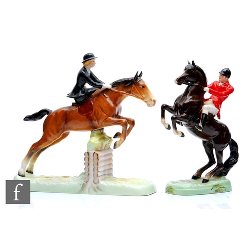 24 - Two Beswick hunting figures comprising Huntsman (On Rearing Horse) model 868, printed crest mark, da... 