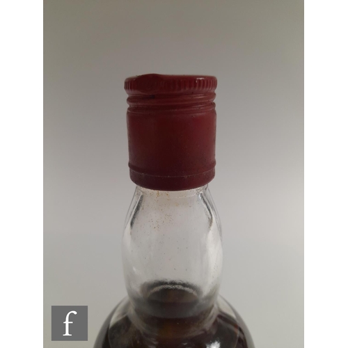 912 - A bottle of Macallan-Glenlivet, pure Highland Malt Liqueur whisky, distilled 1937, bottled by Gordon... 