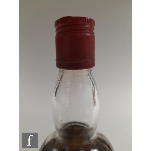 912 - A bottle of Macallan-Glenlivet, pure Highland Malt Liqueur whisky, distilled 1937, bottled by Gordon... 