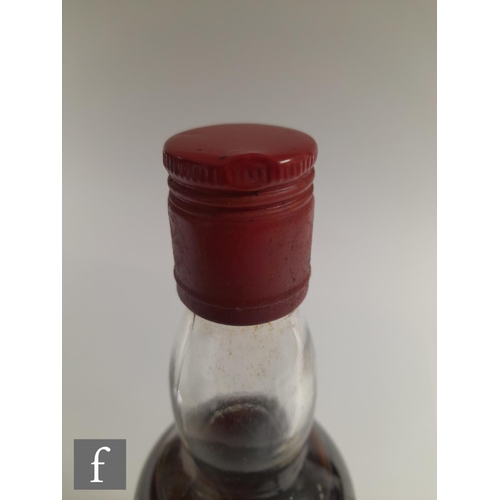 912 - A bottle of Macallan-Glenlivet, pure Highland Malt Liqueur whisky, distilled 1937, bottled by Gordon... 