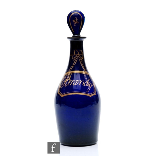 25 - An 18th Century Bristol blue decanter circa 1750, of Indian club form with a disc stopper, gilded wi... 