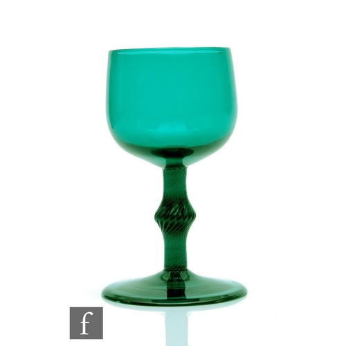 1 - An 18th Century Bristol green drinking glass circa 1755, the ovoid bowl above an incised stem with m... 