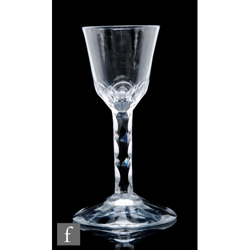 4 - An 18th Century Jacobite drinking glass circa 1775, the round funnel bowl facet cut to the base to r... 