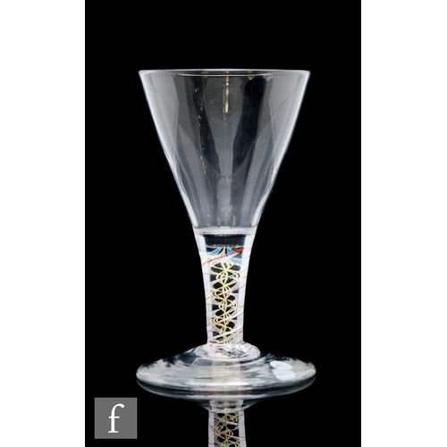 130 - An 18th Century drinking glass circa 1770, the funnel bowl above a colour twist stem with a double e... 