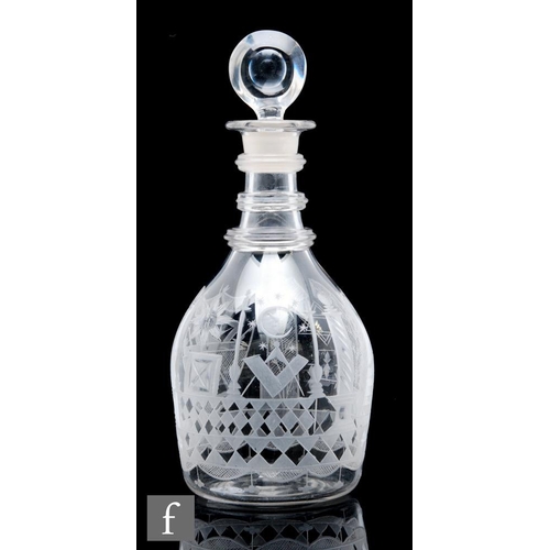 246 - A Georgian clear crystal decanter, of ovoid form with tall collar neck and three annulated neck ring... 