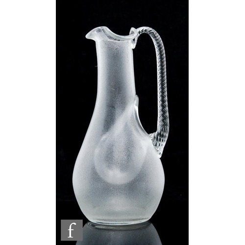 485 - A large late 19th Century champagne jug of swollen ovoid form with integral ice pocket and plain col... 