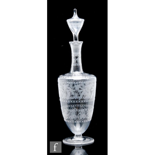 490 - A 19th Century Richardsons clear crystal decanter, of footed shouldered ovoid form with tall collar ... 