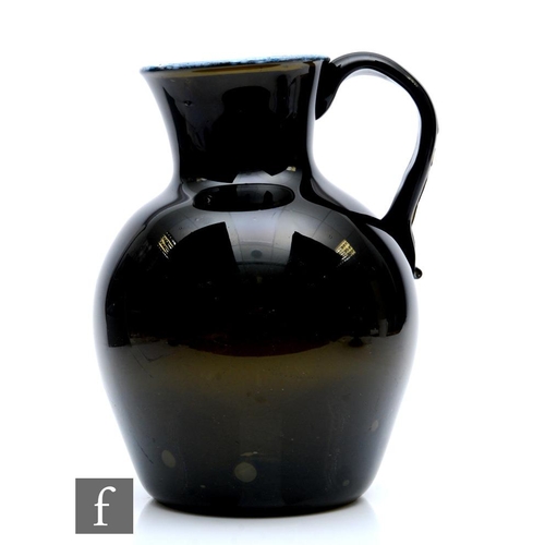 313 - A very large 18th Century, Nailsea jug circa 1790, the swollen ovoid body rising to a flared collar ... 