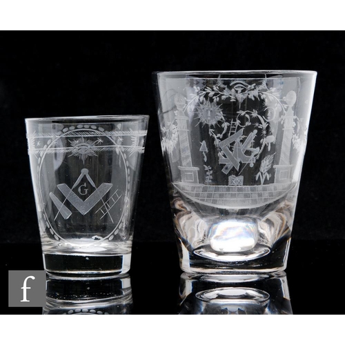 263 - An 18th Century glass tumbler circa 1800, engraved with a panel of Masonic emblems, floral drapery a... 