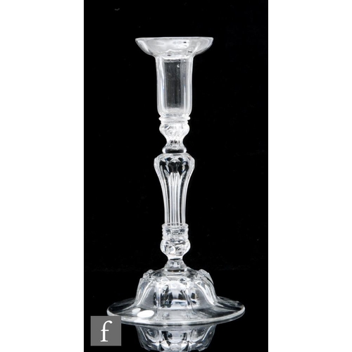 268 - An 18th Century glass candlestick circa 1740, with rib moulded drip pan over a beaded knop and colla... 