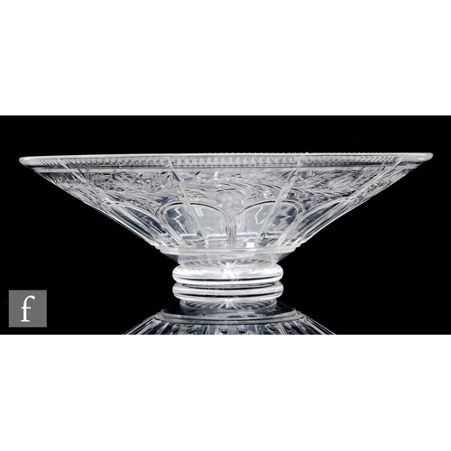 524 - A large 1930s John Walsh Walsh clear cut crystal glass bowl of footed conical form, the exterior cut... 