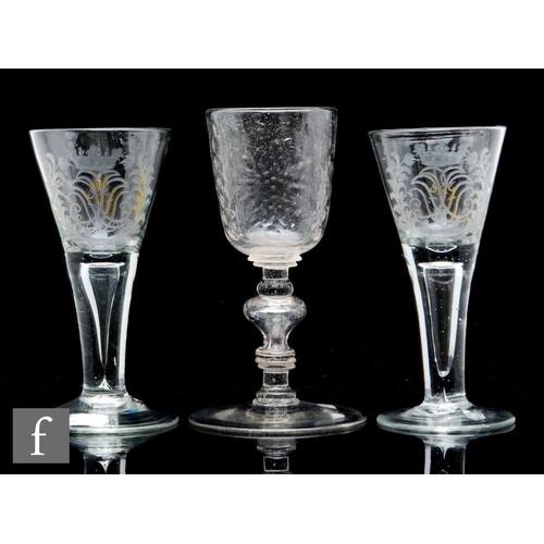 287 - A pair of late 18th Century Lauenstein two piece wine glasses, circa 1760, the drawn trumpet bowl en... 