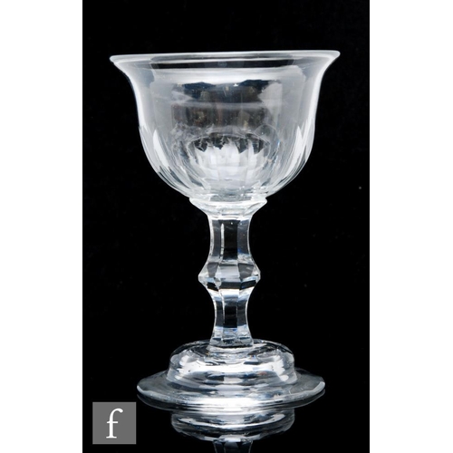 119 - An 18th Century sweetmeat glass circa 1760, the ovoid bowl with flared rim with basal facet cutting,... 